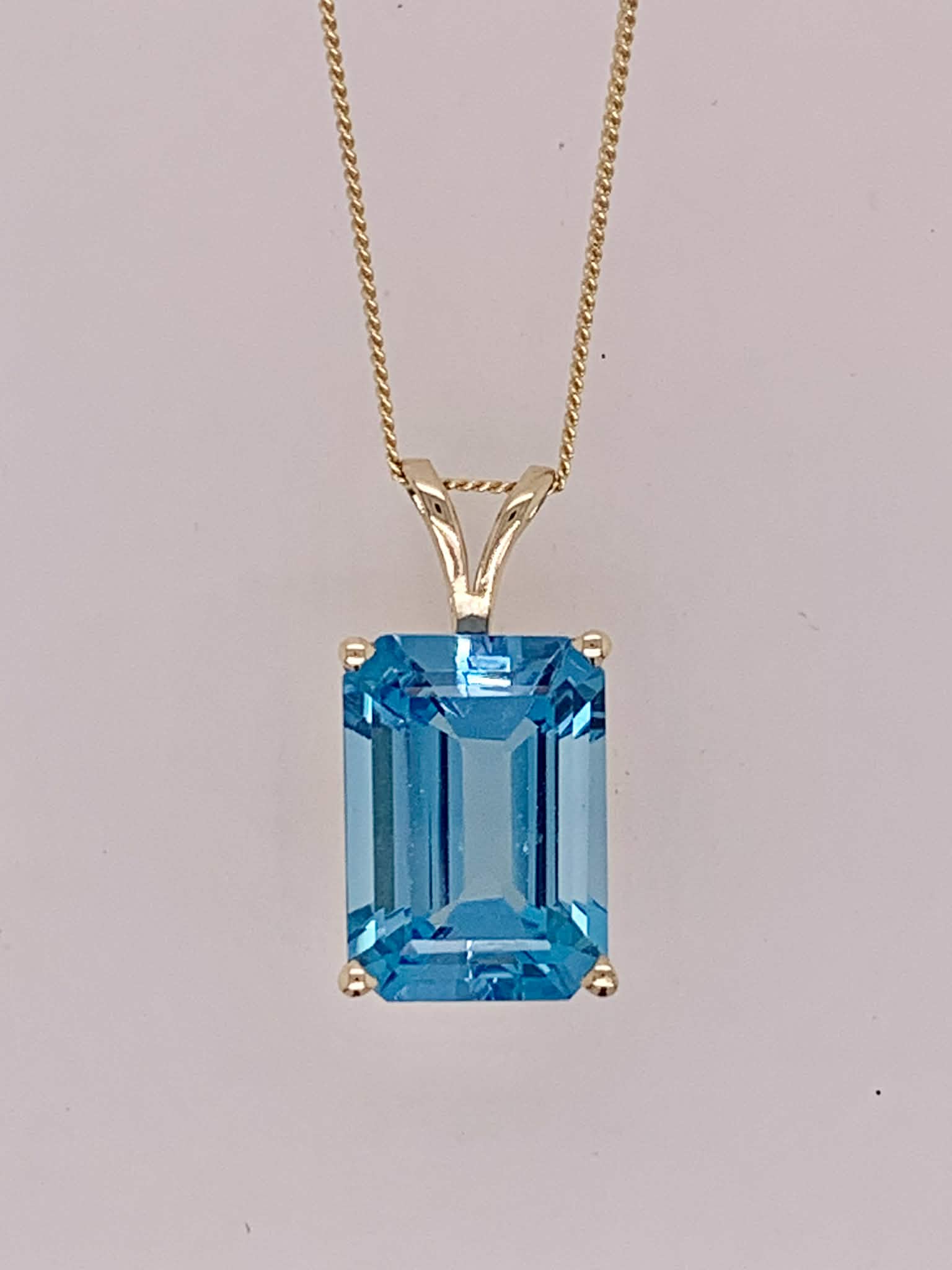 14K Blue Topaz Pendant
